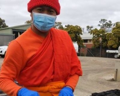 Muny planting seeds at the nursery