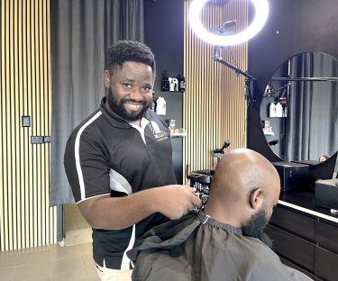 Mussa's barber shop dreams come true